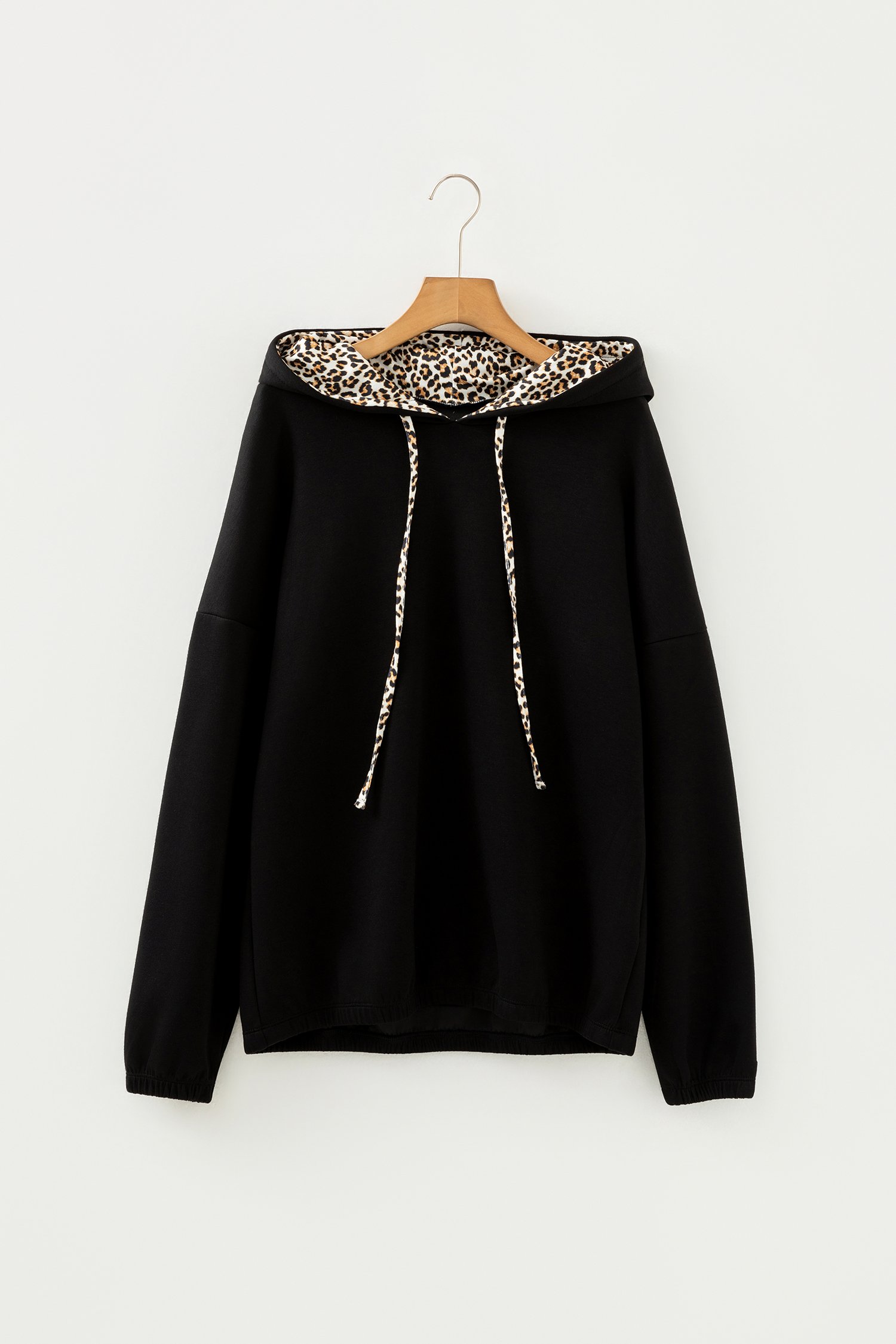 96211683-f8d152a9045dd970.jpg black leopard contrast drawstring hood drop shoulder loose top